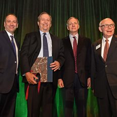 David Cowen, Larry Summers, Ray Dalio and Dick Sylla at the 2017 Gala