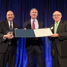 David Cowen and MoAF Chairman Dick Sylla present Ken Griffin with the 2018 Schwab Award
