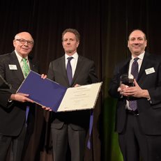 David Cowen and MoAF Chairman Dick Sylla present Tim Geithner with the 2018 Whitehead Award