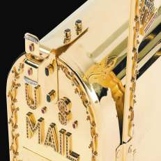 Gold and jeweled mailbox by Sidney Mobell, courtesy of the National Museum of Natural History
