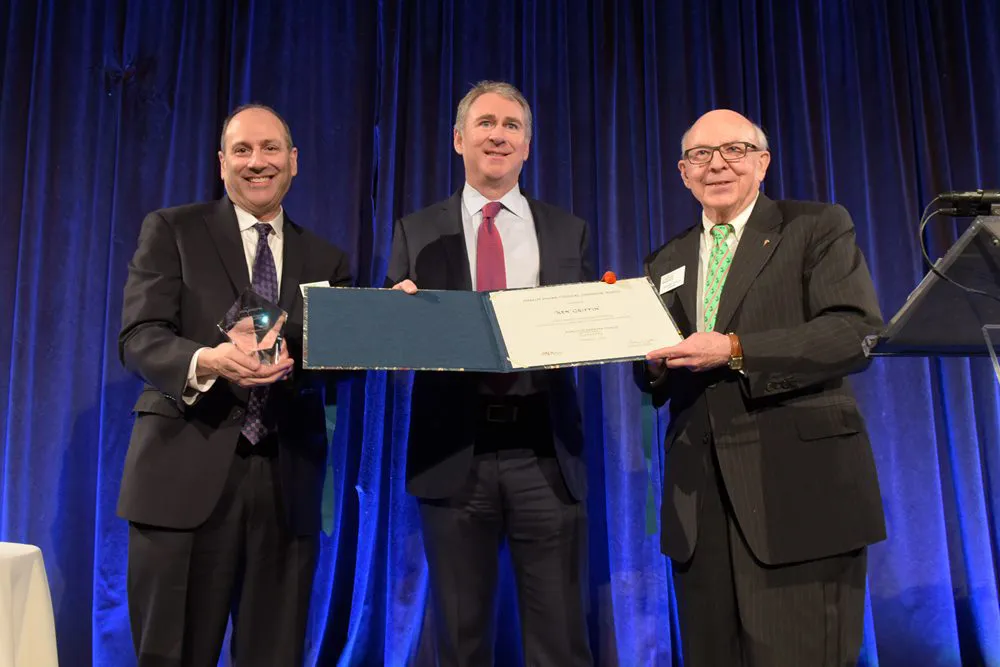David Cowen and MoAF Chairman Dick Sylla present Ken Griffin with the 2018 Schwab Award