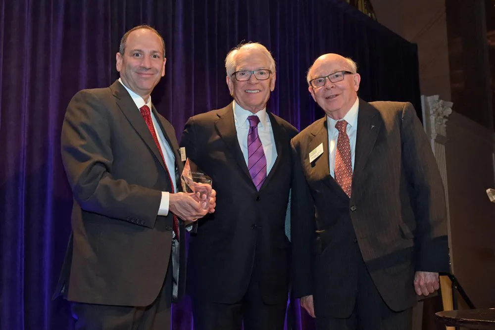 David Cowen and MoAF Chairman Dick Sylla present Charles Schwab with the 2016 Financial Innovation Award