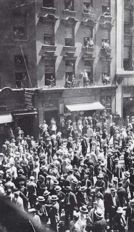 Business conducted on the streets by the Curb Exchange before they moved indoors.
